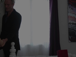 Hot blonde in black fishnet stockings giving blowjob